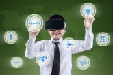 Boy uses VR headset and futuristic screen Junde nutzt eine VR Brille und einen zuküntftigen Bildschirm.