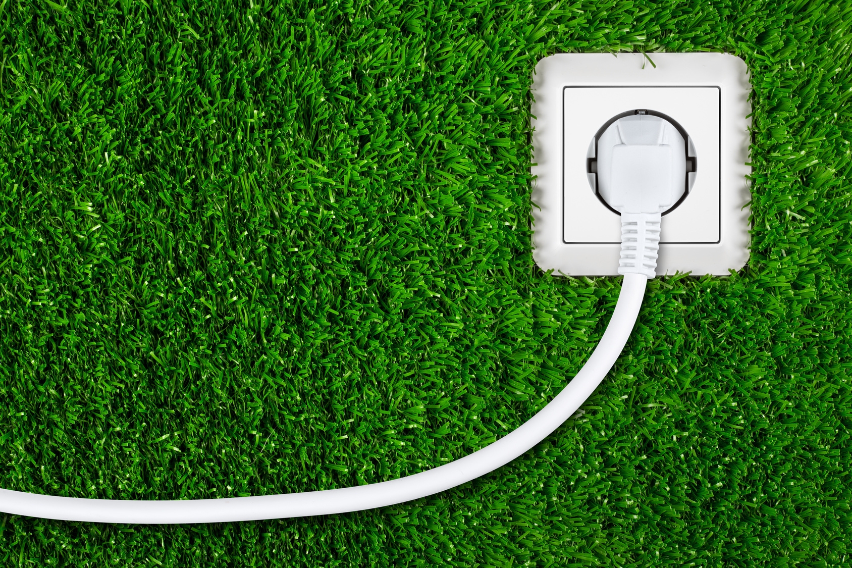 green energy Steckdose in Gras