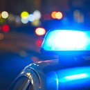 Polizei Auto auf der Straße bei Nacht