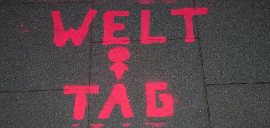Graffiti in german on a sidewalk on occasion of international women's day. Graffiti in german on a sidewalk on occasion of international women's day.