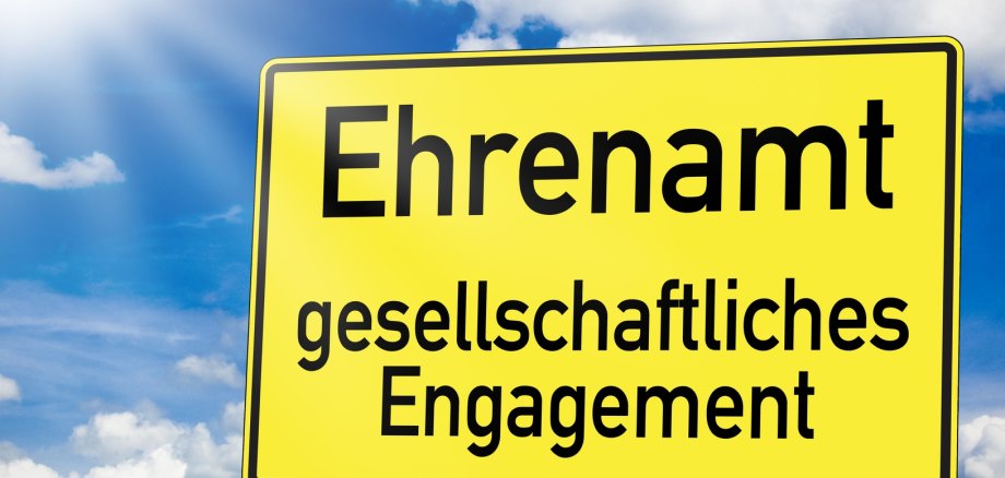 Verkehrsschild mit Ehrenamt Verkehrsschild mit Ehrenamt aufschrifft