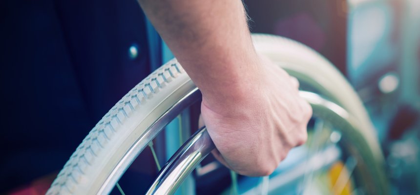 Disabled man on a wheelchair Behinderter Mann im Rollstuhl
