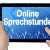 Tablet mit der Aufschrifft Onlinesprechstunde