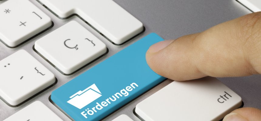 Förderungen Tastatur Finger