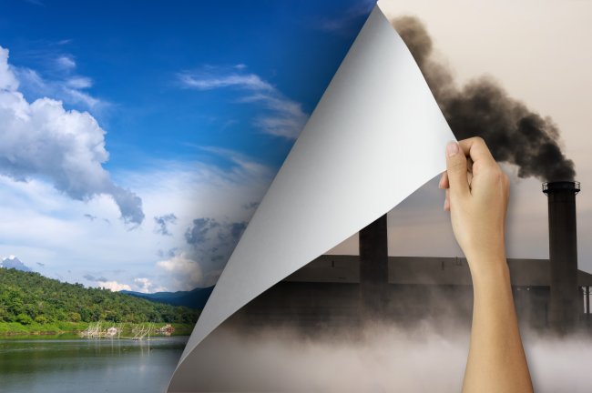 Change concept, Woman hand turning pollution page revealing nature landscape, changing reality, hope inspiration,environmental protection, change weather, environmental campaign.