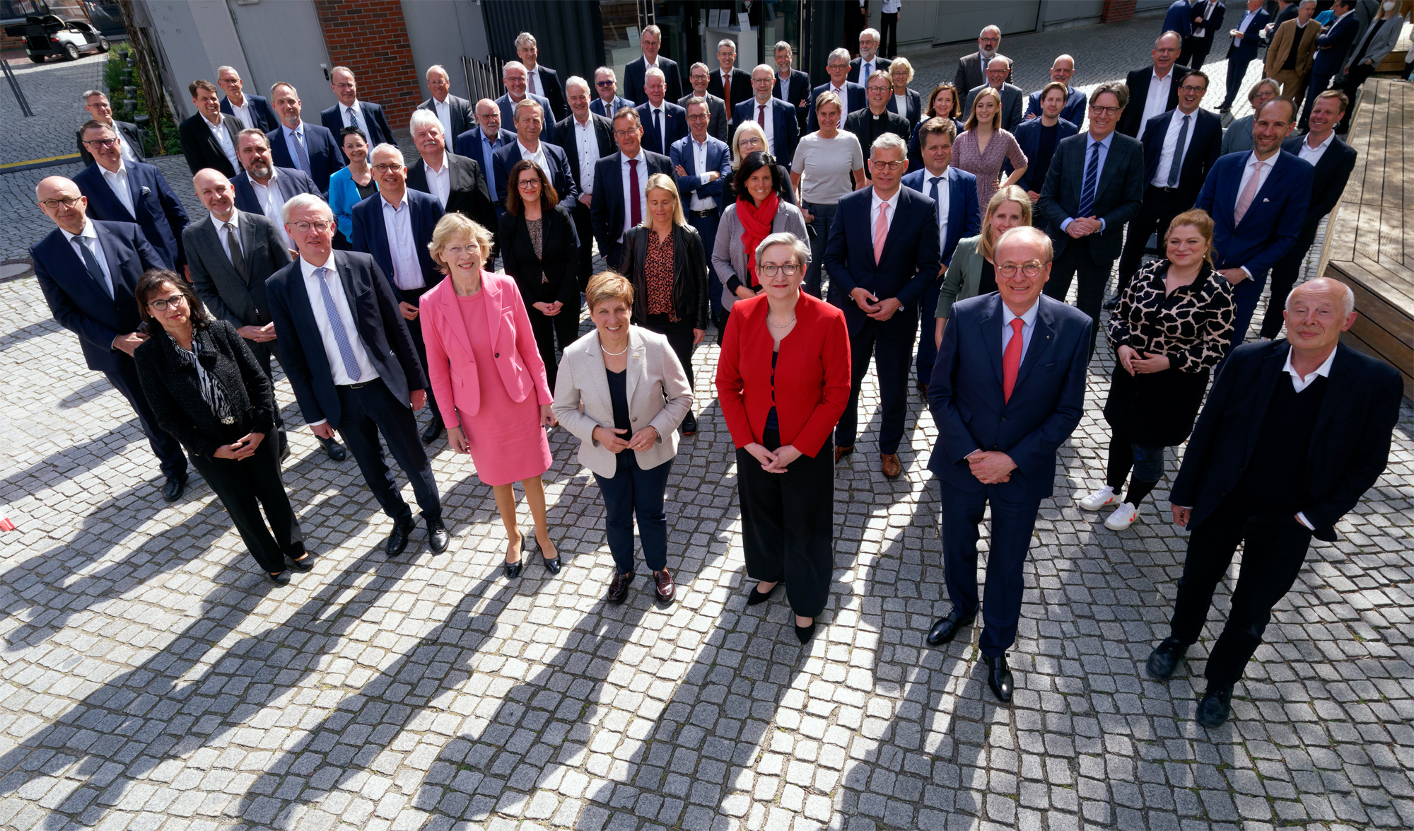 Gruppenfoto der Teilnehmer:innen des Treffens des Bündnisses für bezahlbaren Wohnraum in Berlin im April 2022